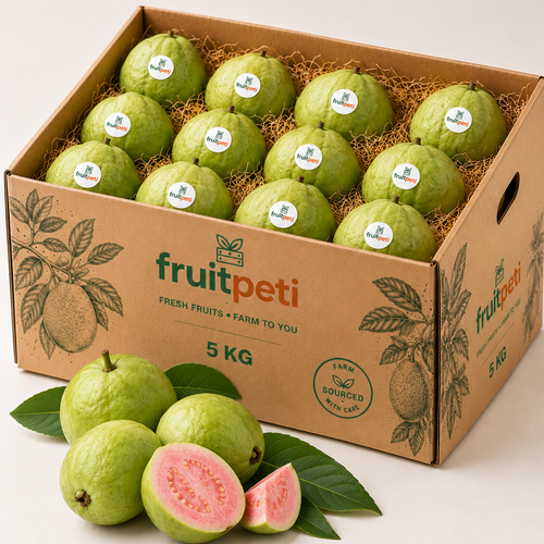 A 5 kg cardboard box filled with green guavas on a light beige background, with a few whole and sliced guavas placed in front. The box is branded 'fruitpeti' and the fruit pieces have small round labels.