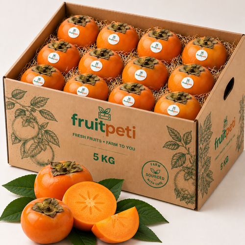 A 5 kg cardboard box filled with orange persimmon fruits on a white background, with three whole and two cut open persimmon fruits displayed in front. The box is branded 'fruitpeti'.