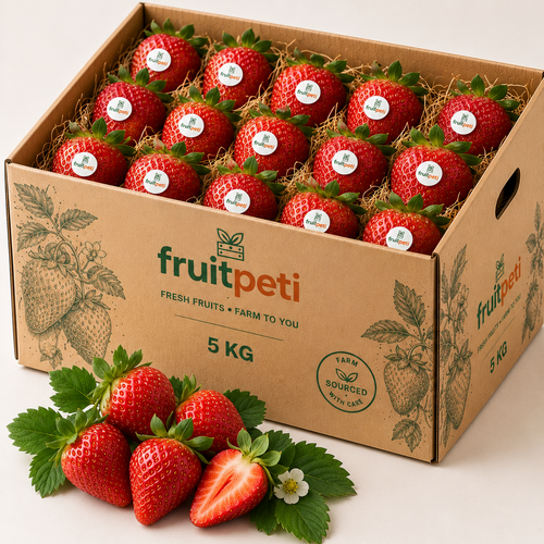 A 5 kg cardboard box filled with fresh strawberries, shown open with several loose strawberries and green leaves in front on a light neutral background. The box is branded fruitpeti.